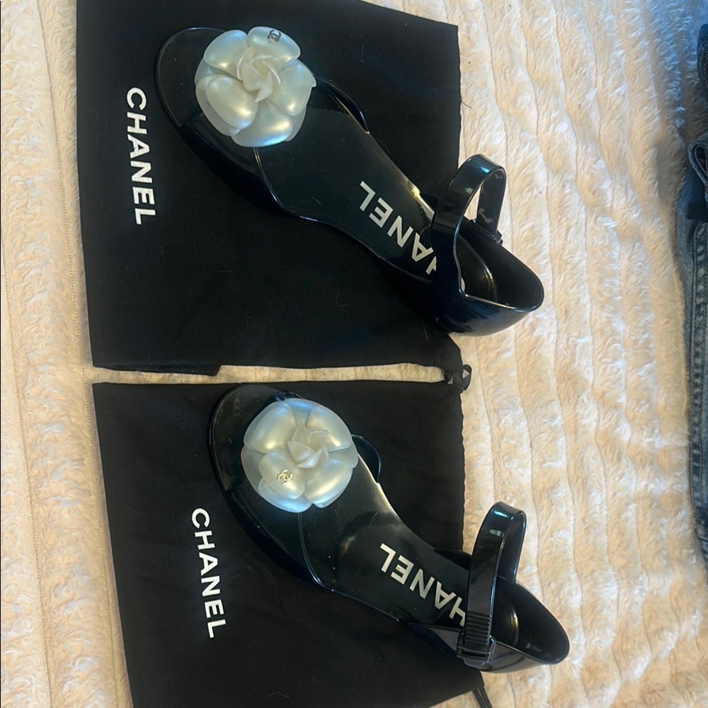 CHANEL Black and White Designer Sandals with Elegant Ornament